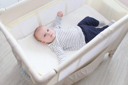 The best portable cribs for travel are lightweight, compact and easily fold up to fit in a suitcase. Here we review the best portable cribs available on the market today.