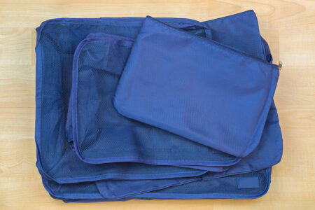 Learn how to pack with travel cubes - the best way to organize your clothing in your suitcase or bag.